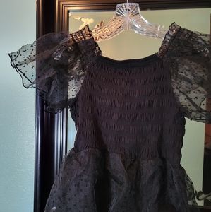 Black off shoulder blouse with sheer sleeves & bottom